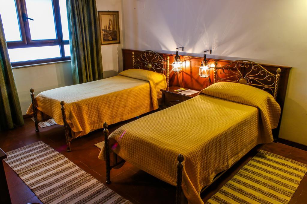 Al Cortiletto Hotel เรจโจ ดี คาลาเบีย ห้อง รูปภาพ