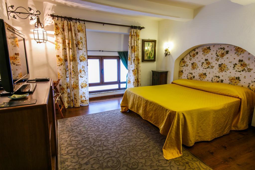 Al Cortiletto Hotel เรจโจ ดี คาลาเบีย ห้อง รูปภาพ